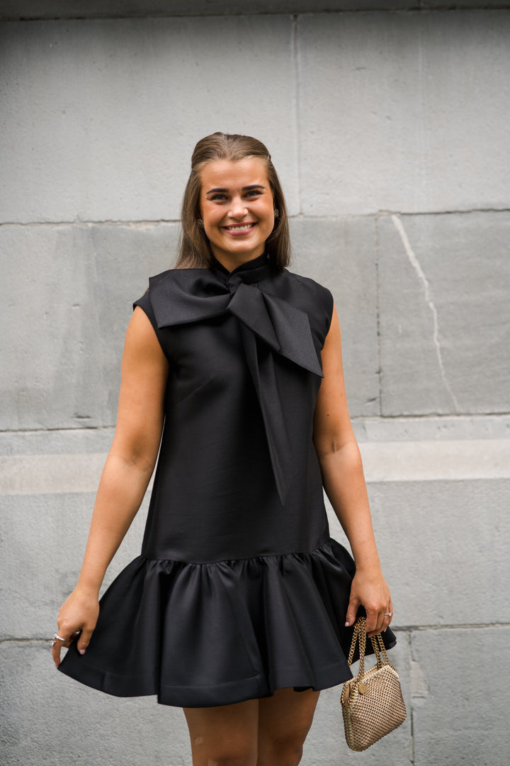 Hypnotic Bow Mini Dress