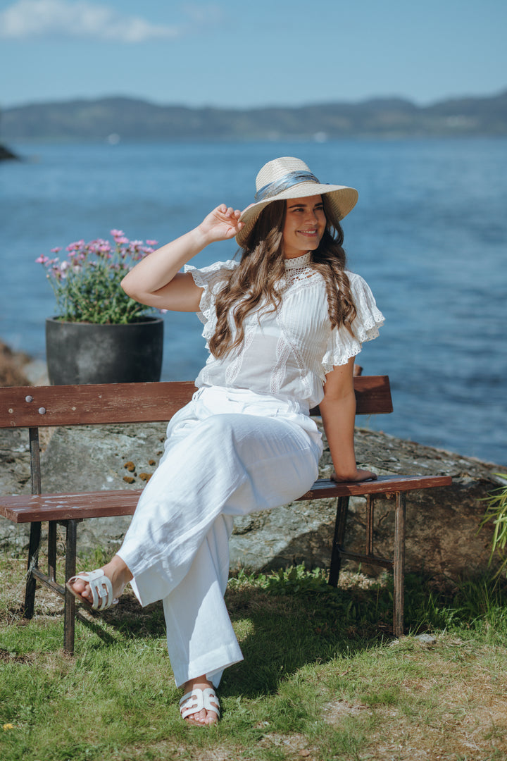 OFF-WHITE BLOUSE WITH APPLIQUES