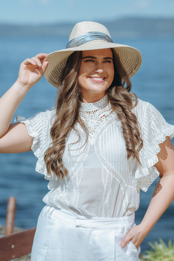OFF-WHITE BLOUSE WITH APPLIQUES