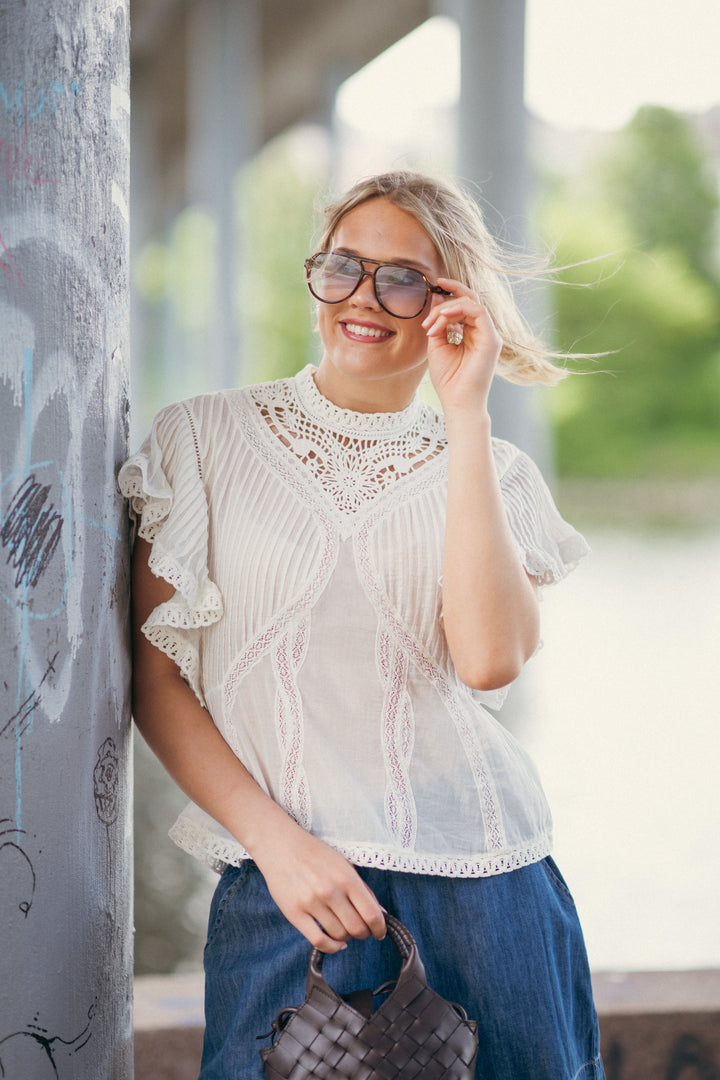 OFF-WHITE BLOUSE WITH APPLIQUES