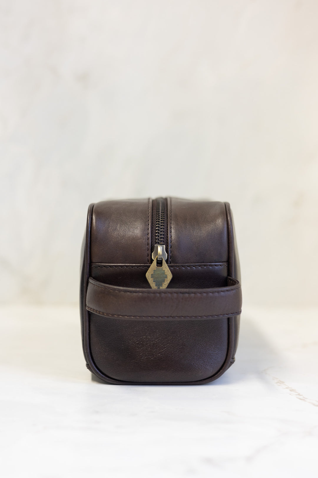 Hombre washbag - brown leather with multi stitching