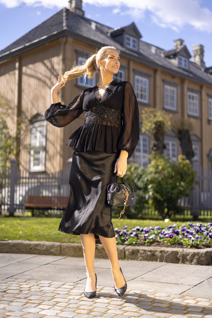 Luna Peplum Blouse